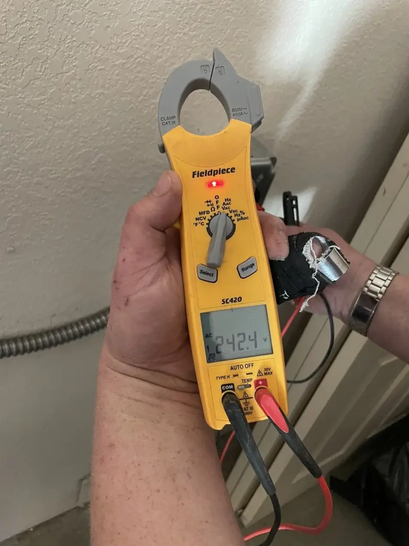Voltage testing with clamp meter during Aluminum Wiring Replacement in Lebanon